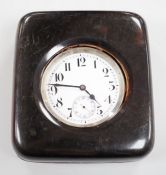 A tortoiseshell mounted travelling watch case, containing a Swiss white metal pocket watch, case