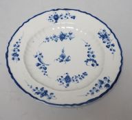 An 18th century Caughley plate painted, with brightsprigs, impressed mark Salopian, 19.5cms