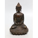 A Himalayan bronze figure of Buddha, 19.5cms high