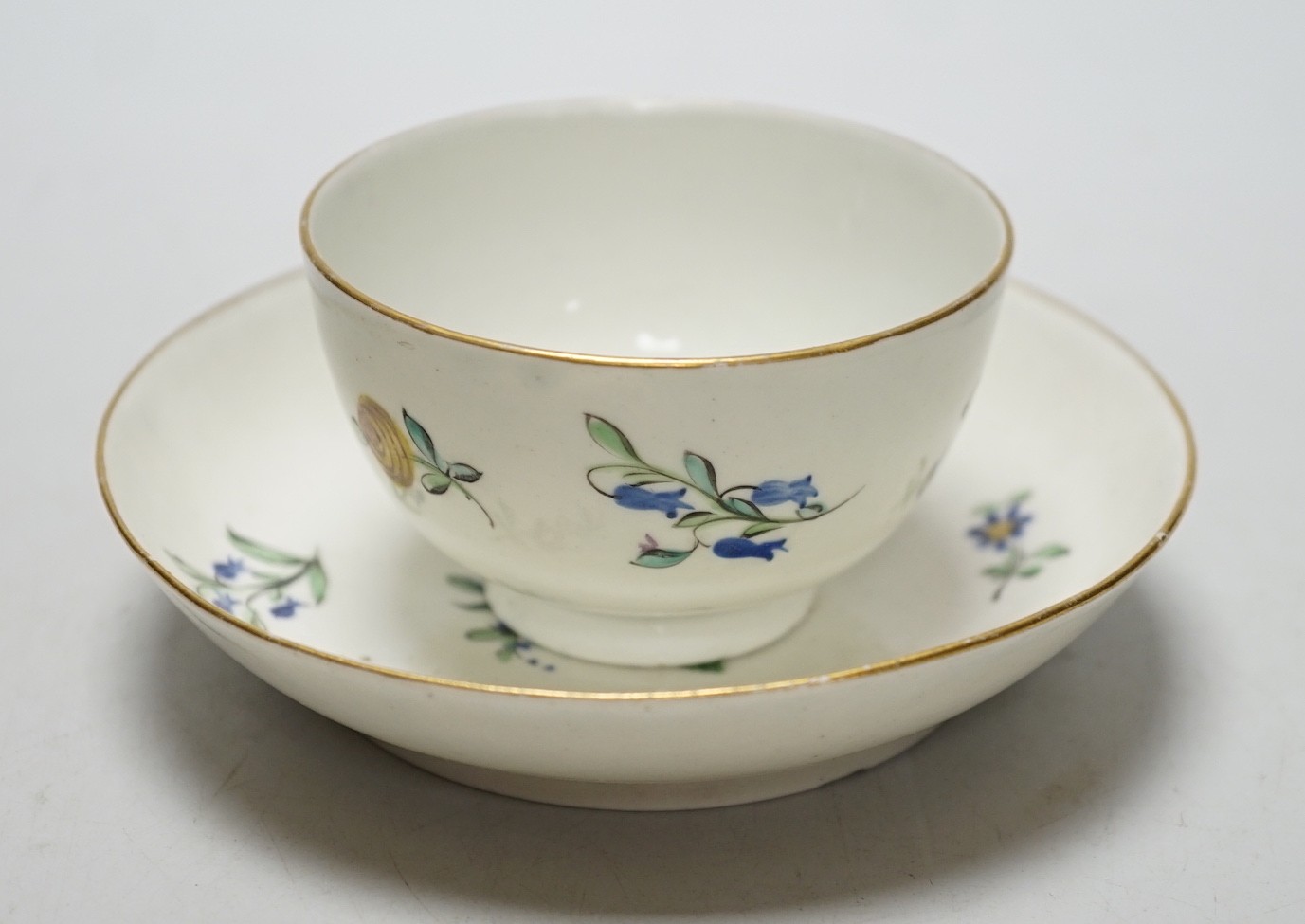 Eight 18th century Caughley teabowl and saucer with Back to Back Roses. 6cm overall