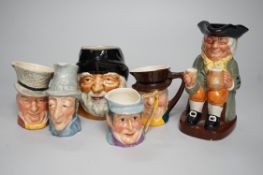 Five Royal Doulton toby jugs and a collection of similar toby jugs