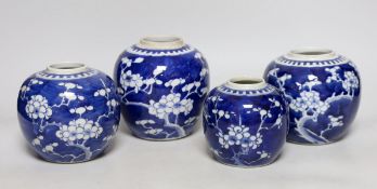 Four Chinese blue and white ‘prunus’ jars, tallest 14cms high
