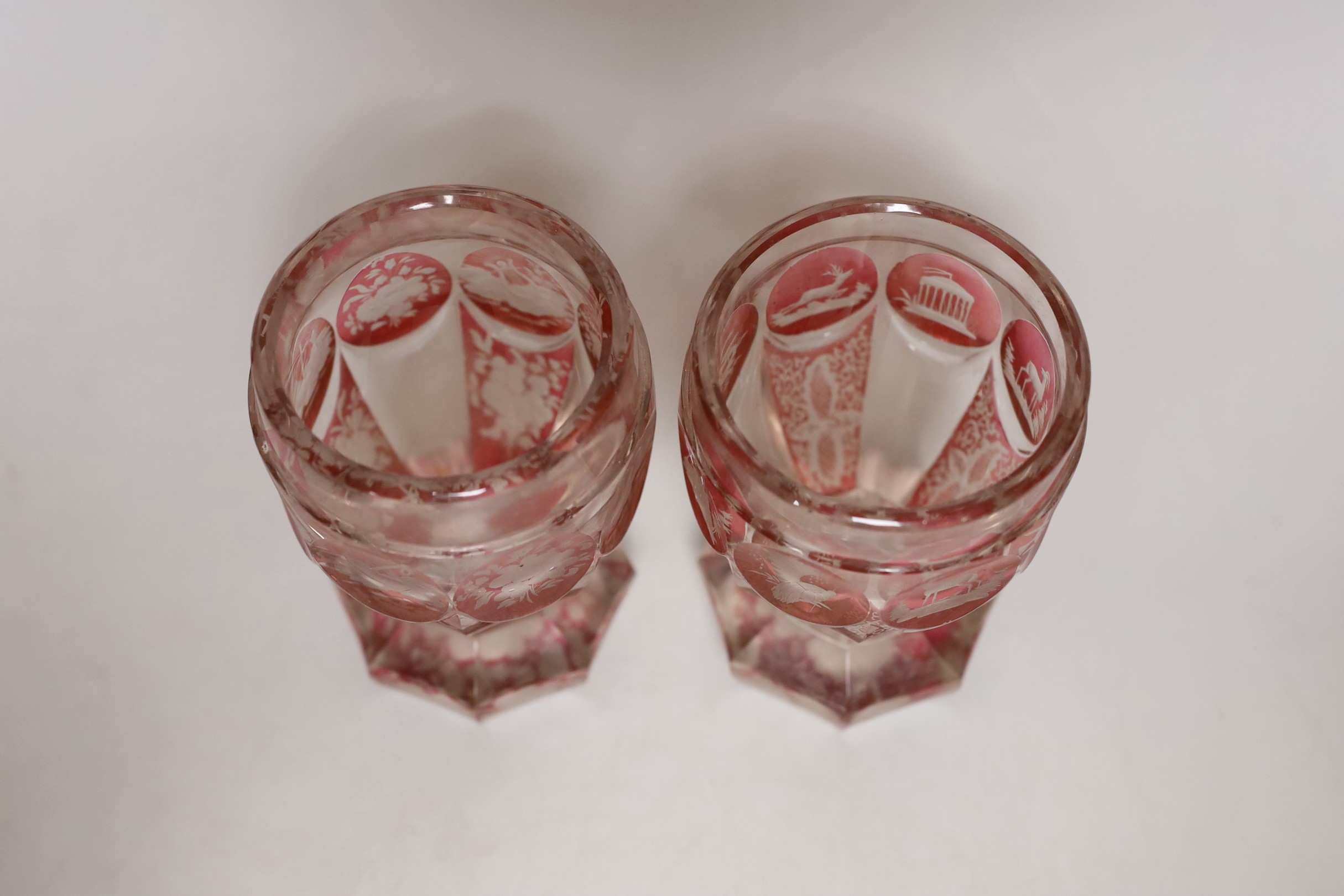 A pair of late 19th century Bohemian wheel engraved ruby stained glass beakers, 13.5cms high - Image 3 of 4