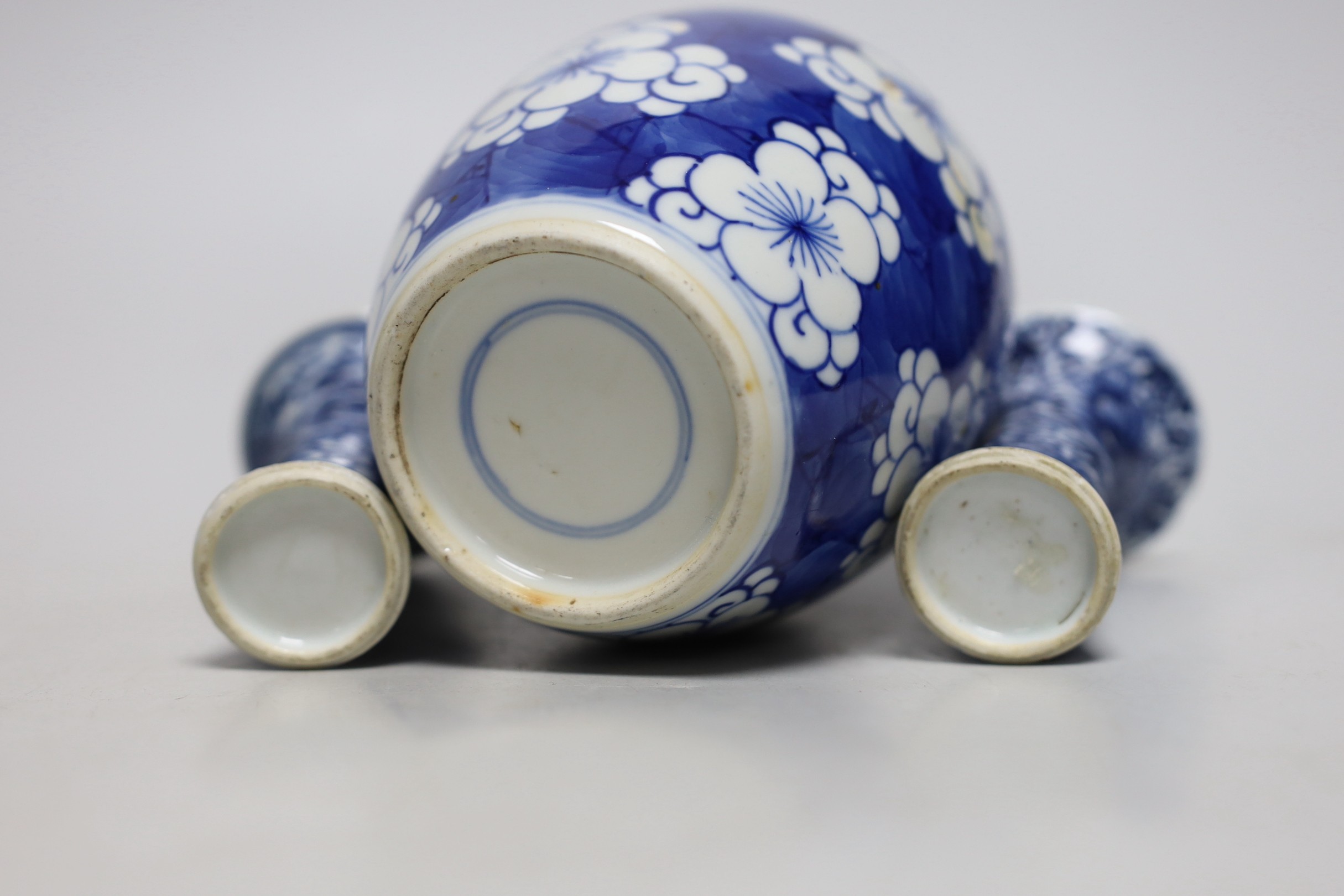 A Chinese blue and white prunus jar, two miniature vases and a dish, all Kangxi period, jar 14cms - Image 7 of 7