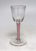 A Dutch red and white colour twist stem wine glass. 15cm tall