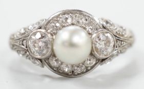 A white metal(stamped Platin), cultured pearl and diamond set circular cluster ring, size M, gross