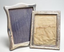 Two silver mounted photograph frames, including Edwardian with repousse border, Birmingham, 1909,