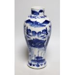 A 19th century Chinese blue and white baluster vase, 23cms high