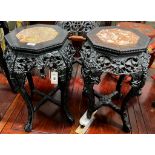 A near pair of Chinese marble top octagonal carved hongmu vase stands, width 40cm, height 62cm