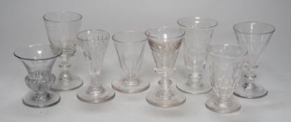 A group of eight Georgian small drinking or jelly glasses, to include a deceptive glass. Tallest
