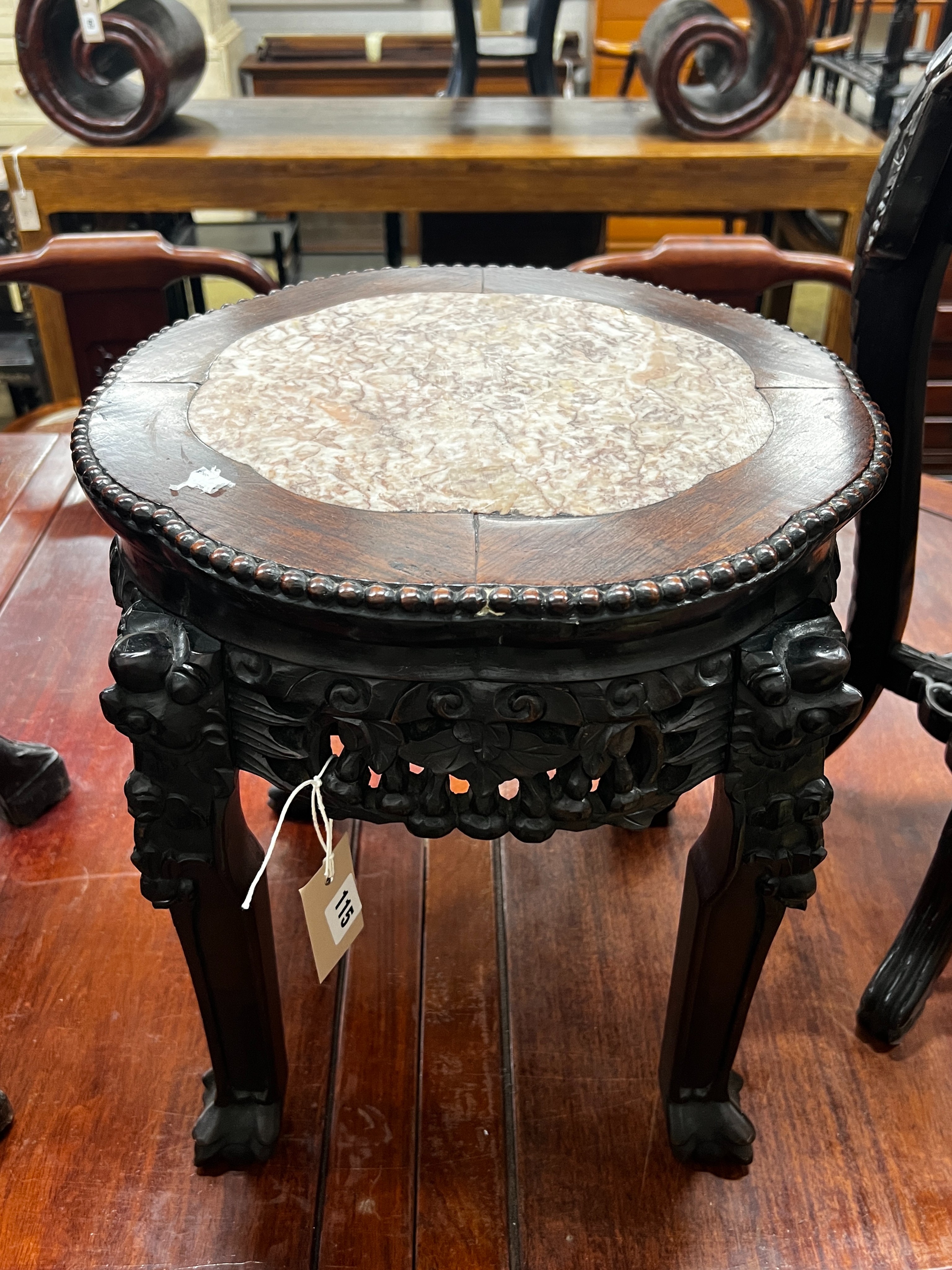 A Chinese circular marble top hongmu vase stand, diameter 36cm, height 39cm