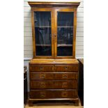 A Queen Anne revival feather banded walnut cabinet on chest, width 91cm, depth 47cm, height 193cm
