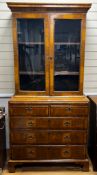 A Queen Anne revival feather banded walnut cabinet on chest, width 91cm, depth 47cm, height 193cm