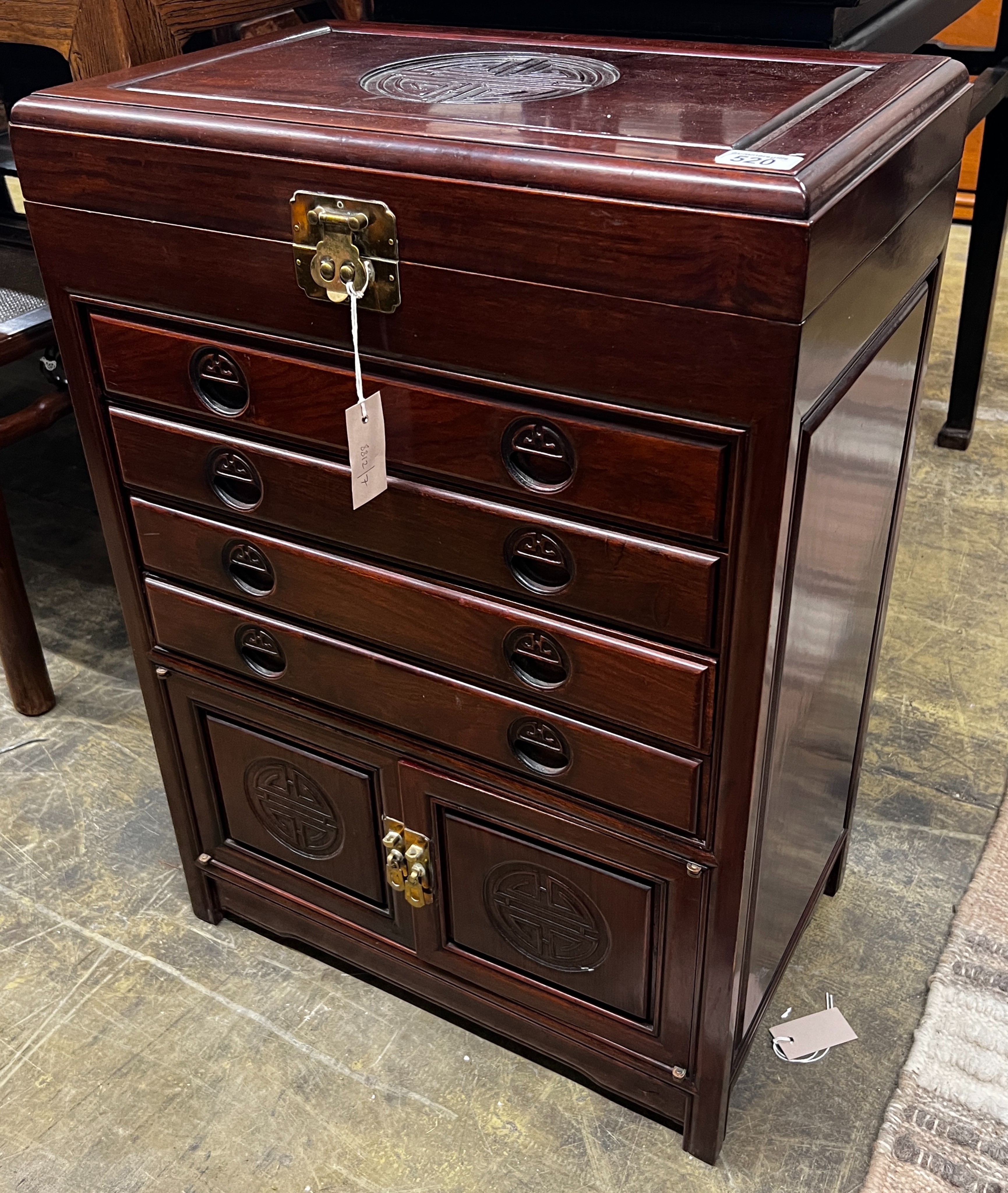 A Chinese carved hardwood canteen cabinet, width 56cm, depth 35cm, height 49cm