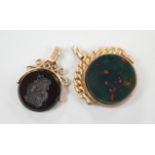 A late Victorian 9ct gold and bloodstone set spinning fob seal, 29mm and one other yellow metal