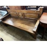 A 19th century Continental panelled settle, length 187cm, depth 70cm, height 92cm