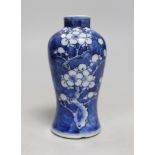 A small 19th century Chinese blue and white prunus vase. 13.5cm tall