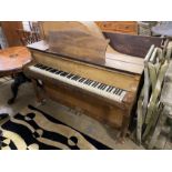 An early 20th century walnut cased upright grand piano by Morley of London, width 142cm