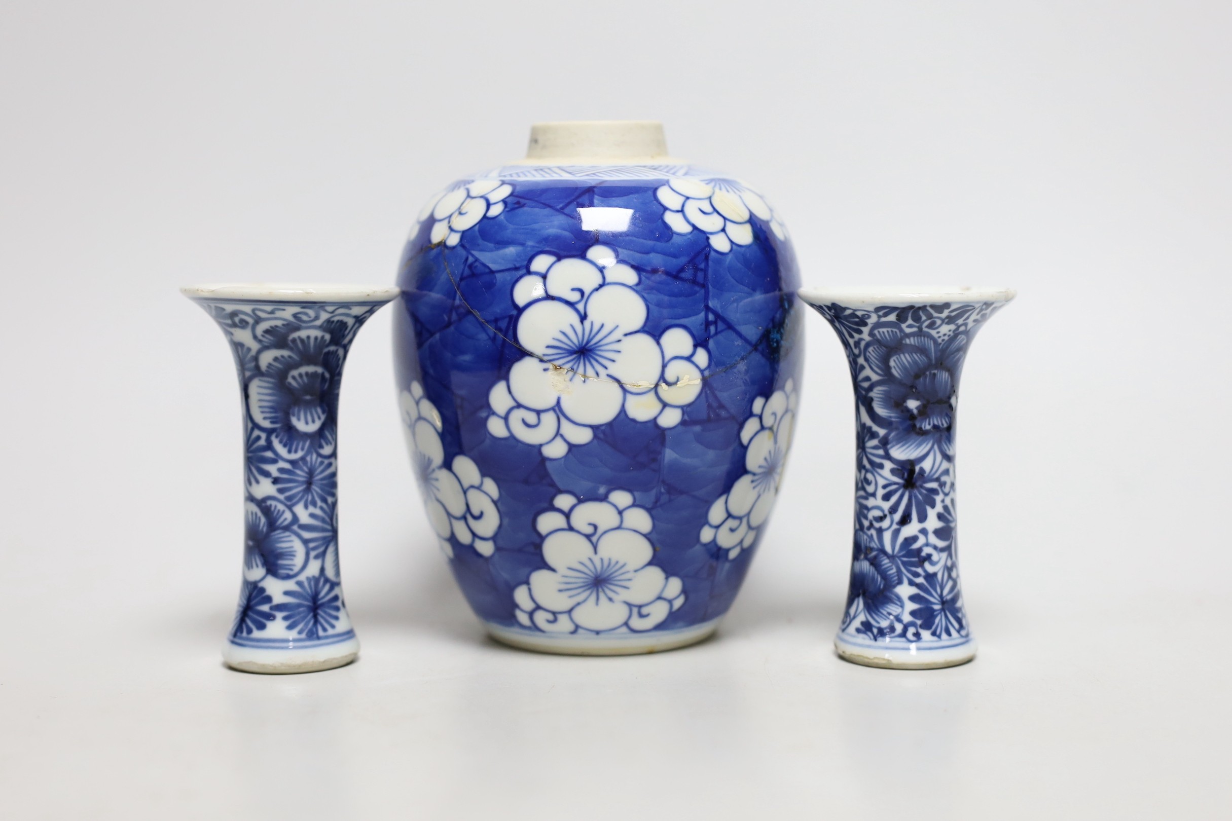 A Chinese blue and white prunus jar, two miniature vases and a dish, all Kangxi period, jar 14cms - Image 4 of 7