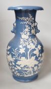 A Chinese slip-decorated blue glazed vase, 40cm