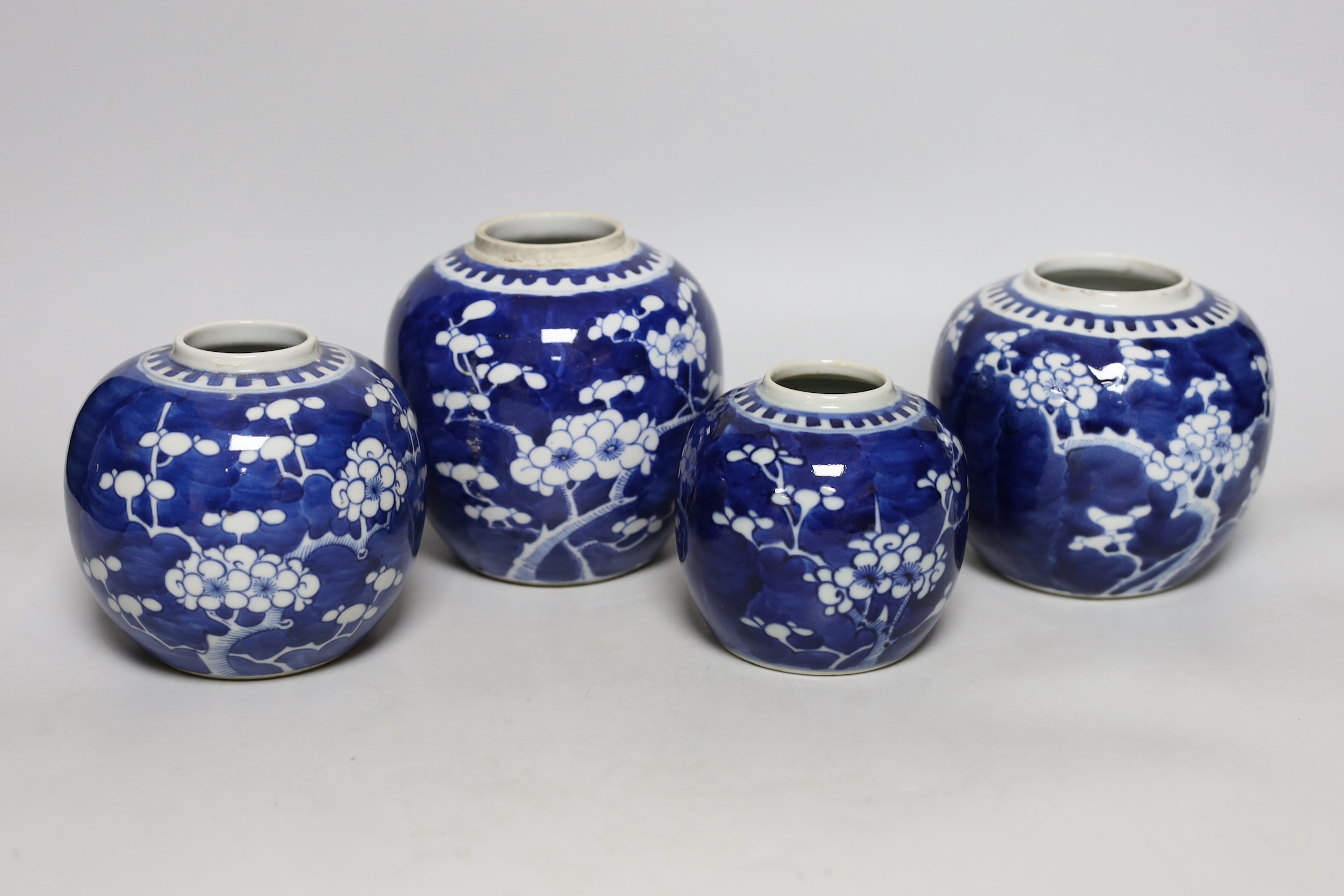 Four Chinese blue and white ‘prunus’ jars, tallest 14cms high - Image 2 of 5