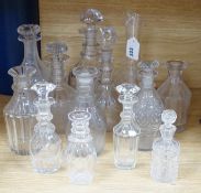 Twelve glass decanters and a carafe (13)