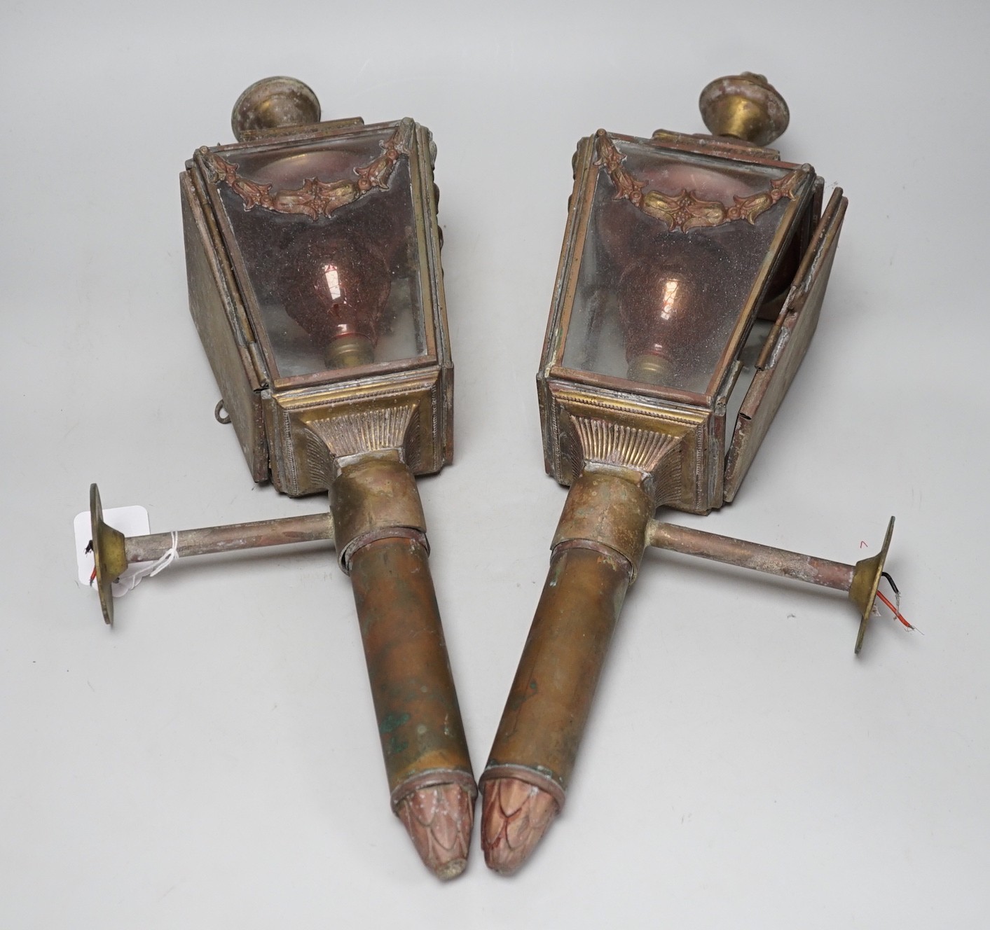 A pair of Victorian coaching lamps, converted to electricity, 51cm high