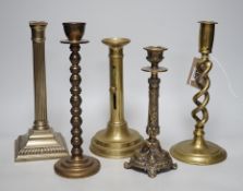 Five various brass candlesticks, tallest 26cms high