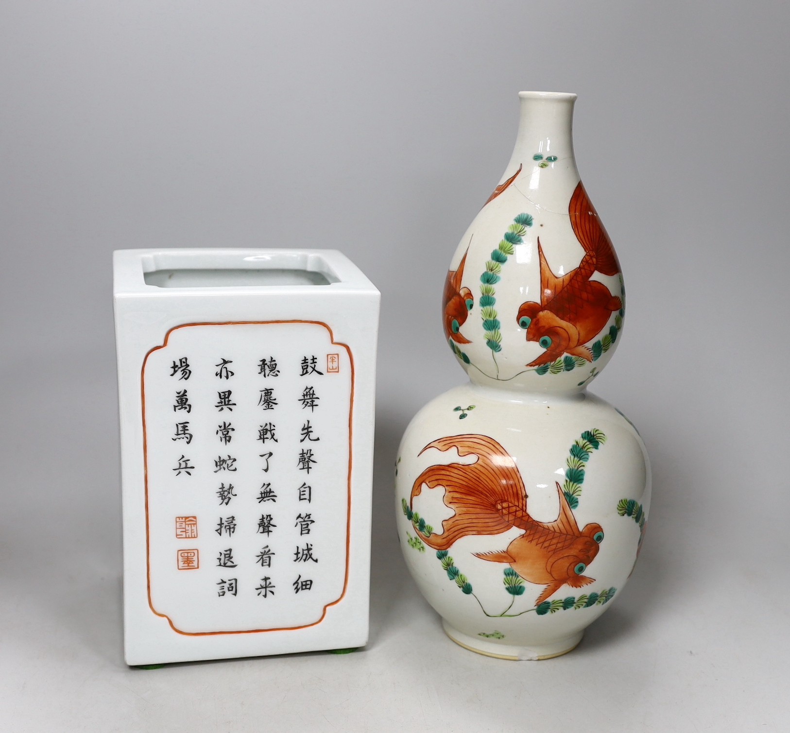 A Chinese iron red and black inscribed square brushpot and a goldfish double gourd vase (a.f.)