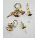 Two 19th century yellow metal overlaid and bloodstone set watch key fobs, one of funnel form,