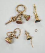 Two 19th century yellow metal overlaid and bloodstone set watch key fobs, one of funnel form,