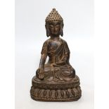 A Chinese gilt iron seated figure of Buddha, 19cm