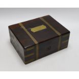 A Victorian rosewood brass bound toilet box, with contents, 21cms deep x 27cms wide