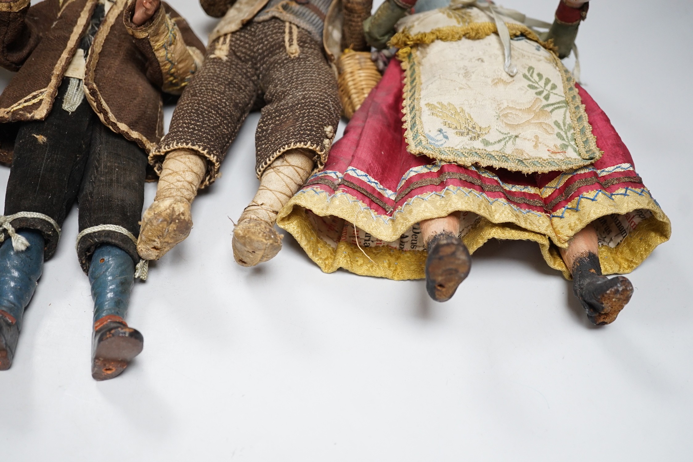 Four 18th/19th century Neapolitan painted wood or terracotta crèche figures, tallest 31.5cm and a - Image 5 of 5