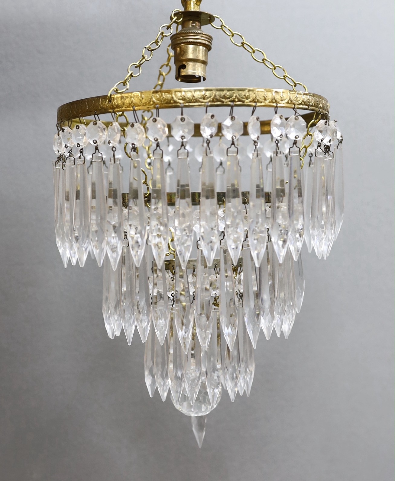 A pair of cut glass lustre drop chandeliers