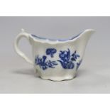 An 18th century Caughley Low Chelsea ewer printed with flowers,6.5 cms high