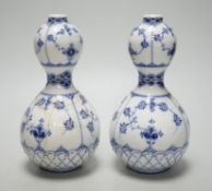 A pair of Royal Copenhagen onion pattern vases, 17cm