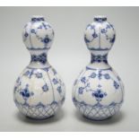 A pair of Royal Copenhagen onion pattern vases, 17cm