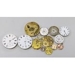 Various pocket and wrist watch movements and dials.