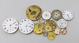 Various pocket and wrist watch movements and dials.