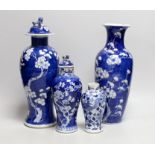A Chinese prunus baluster jar and cover and three others, similar,tallest 30cms high