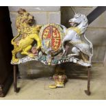 A painted cast iron Royal Coat of Arms, crown detached, width 70cm, height 78cm