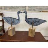A pair of white metal decoy geese, with articulated necks, width 55cm, height 69cm