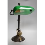 A green glass and brass student lamp, 48cms high