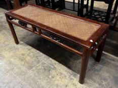 A Chinese caned hardwood rectangular low table, length 110cm, depth 38cm, height 48cm