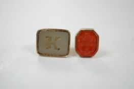 A 19th century yellow metal overlaid and white carnelian set fob seal, the matrix carved with the