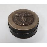 A composition and metal snuff box, with Third Reich insignia. 7cm diameter