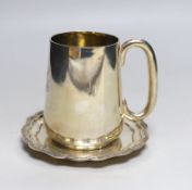 A Victorian silver mug, John Newton Mappin, Sheffield, 1877, height 11.2cm and a later silver