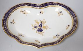 An 18th century Caughley kidney shaped dish with blue and gilt decoration, 28cms wide