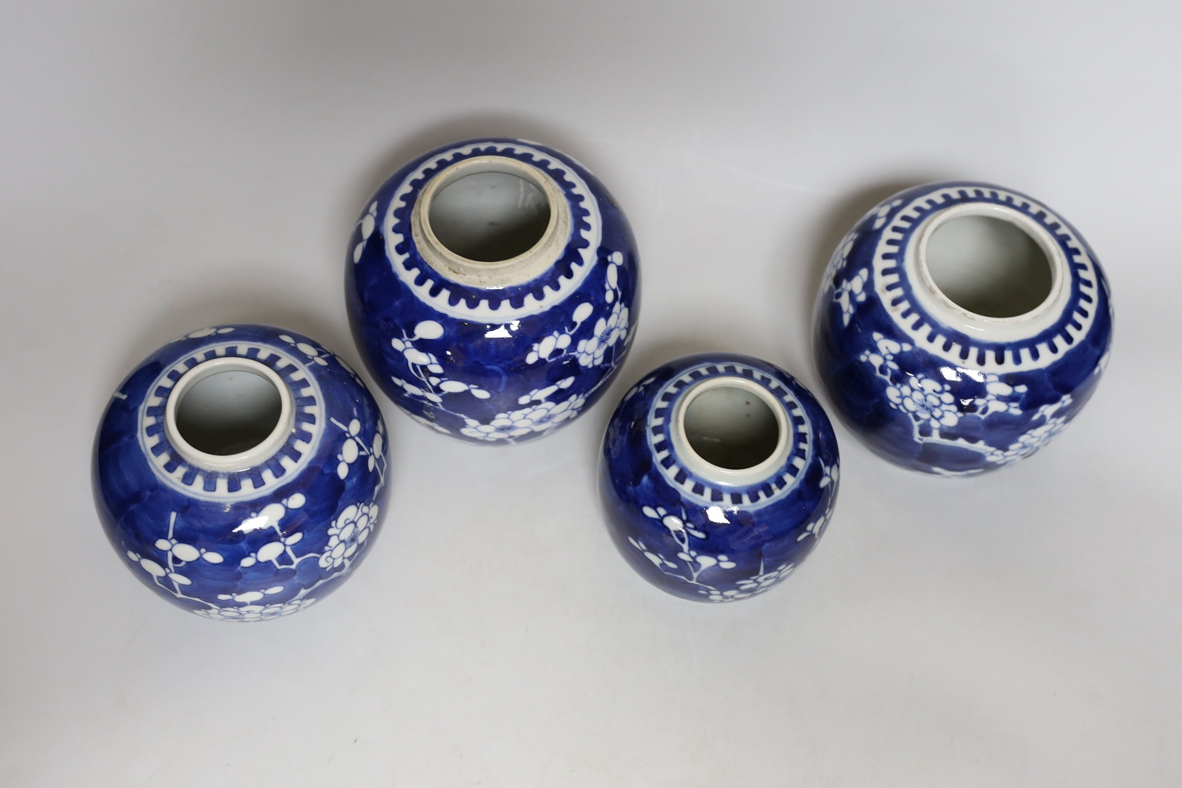 Four Chinese blue and white ‘prunus’ jars, tallest 14cms high - Image 3 of 5